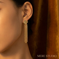 THE LIQUID CASCADE TASSEL DROPS