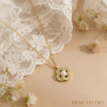 THE LUMOS ORB PEARL PENDANT
