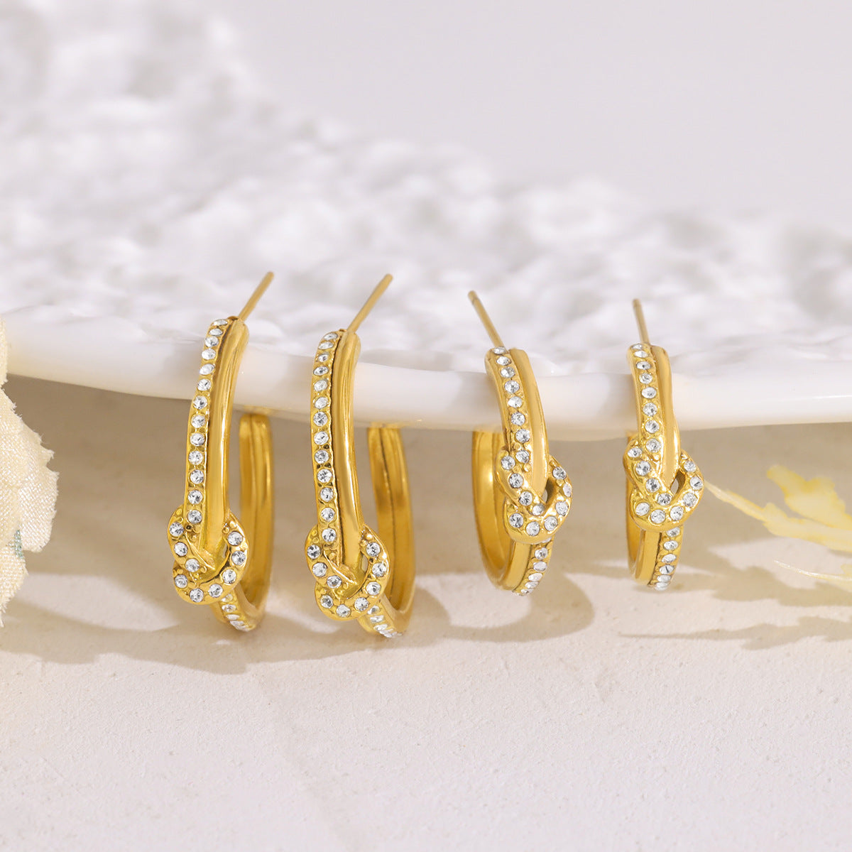THE HELIX PAVÉ BRAIDED HOOPS